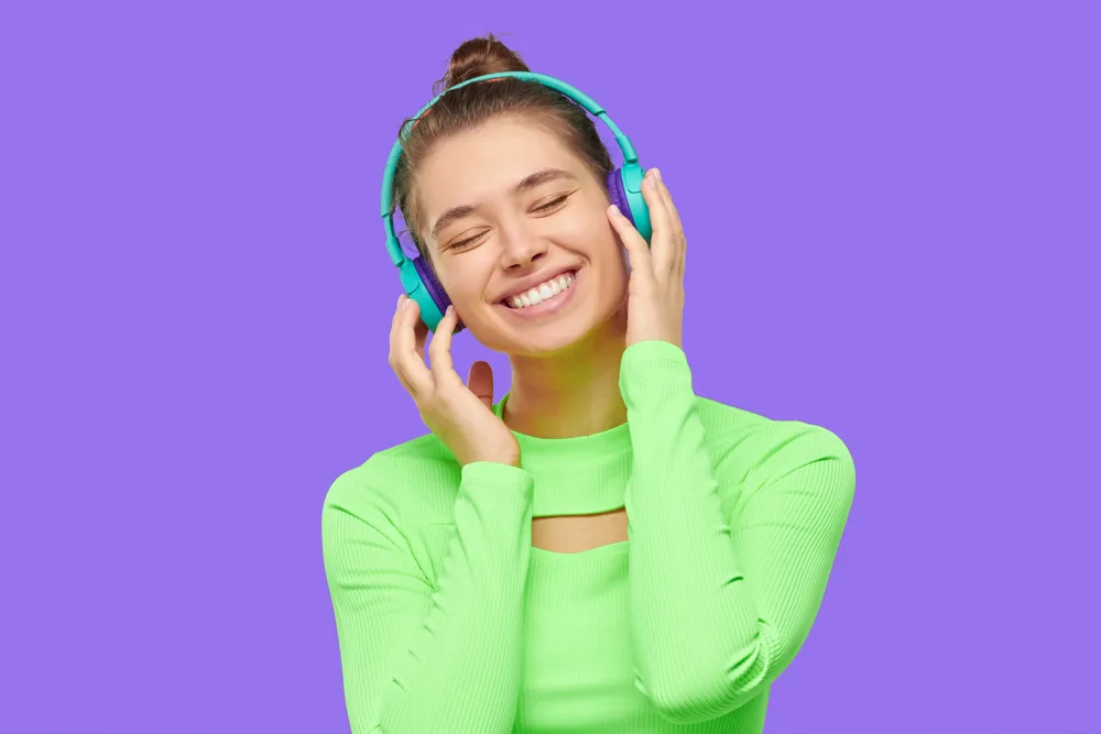 Young Woman Enjoys Music with Headphones
