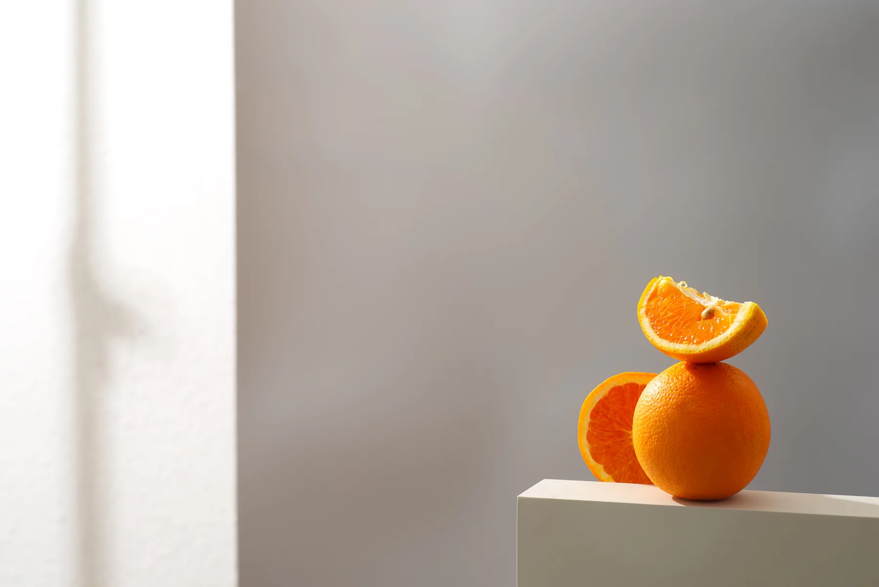 Orange Still Life on White with Gray Backdrop Orange Still Life on White with Gray Backdrop