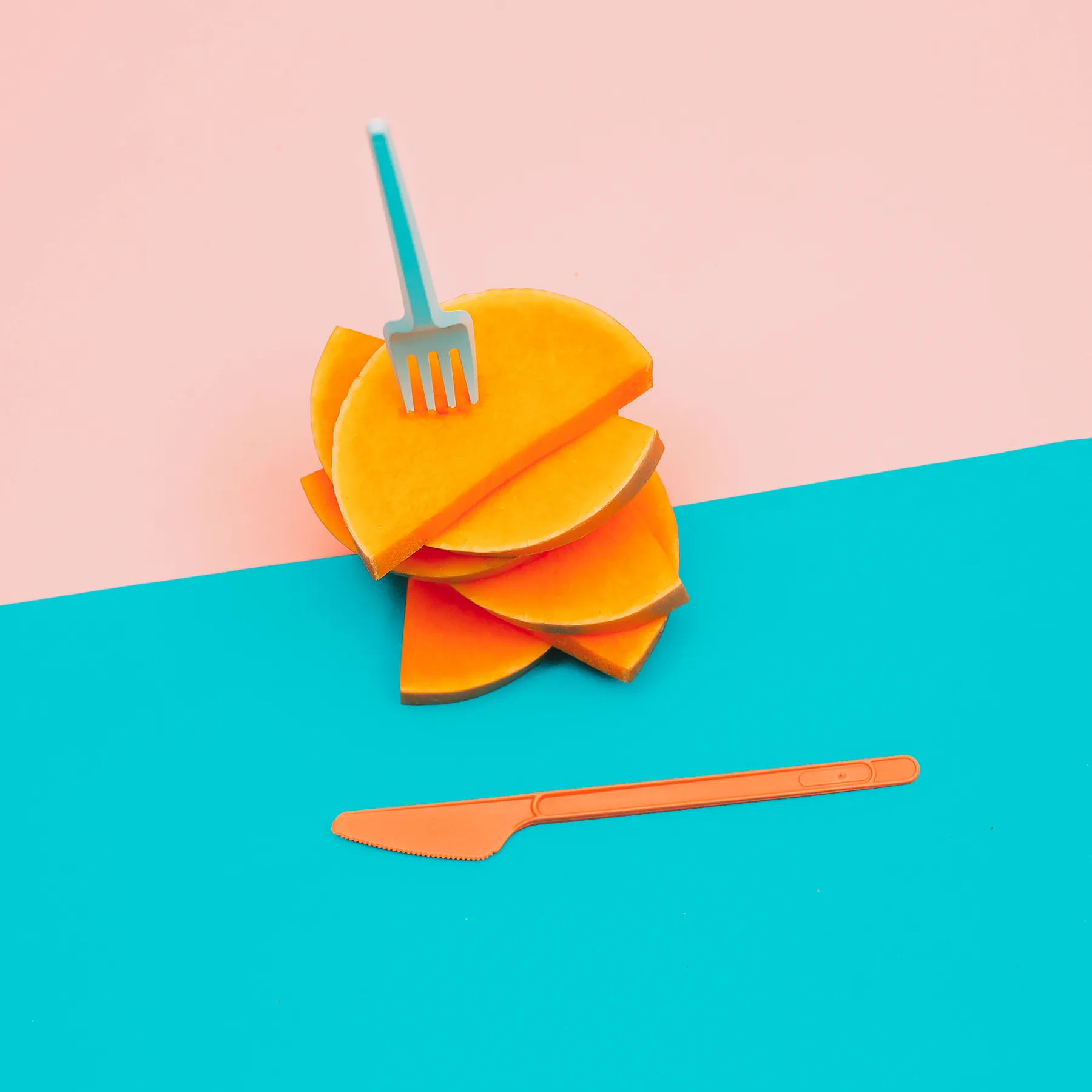 Butternut Squash Slices Stacked with Fork and Knife Butternut Squash Slices Stacked with Fork and Knife