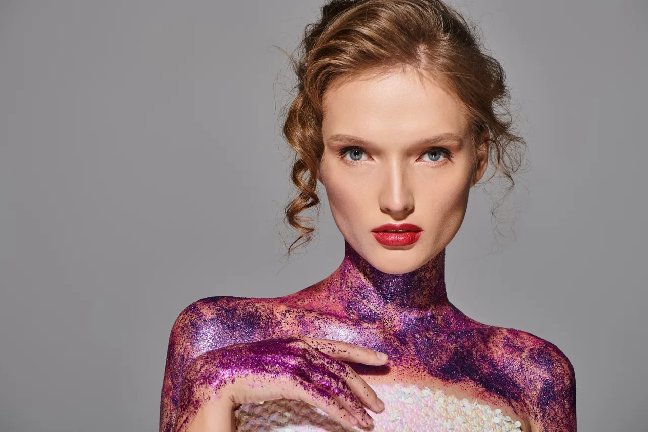 Editorial portrait in a purple sequinned garment
